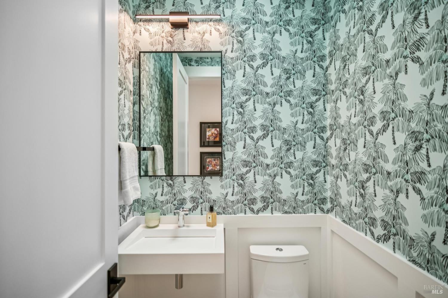 85 Harriet Way Tiburon, CA 94920 - Photo 17 of 44 a bathroom with a sink and mirror