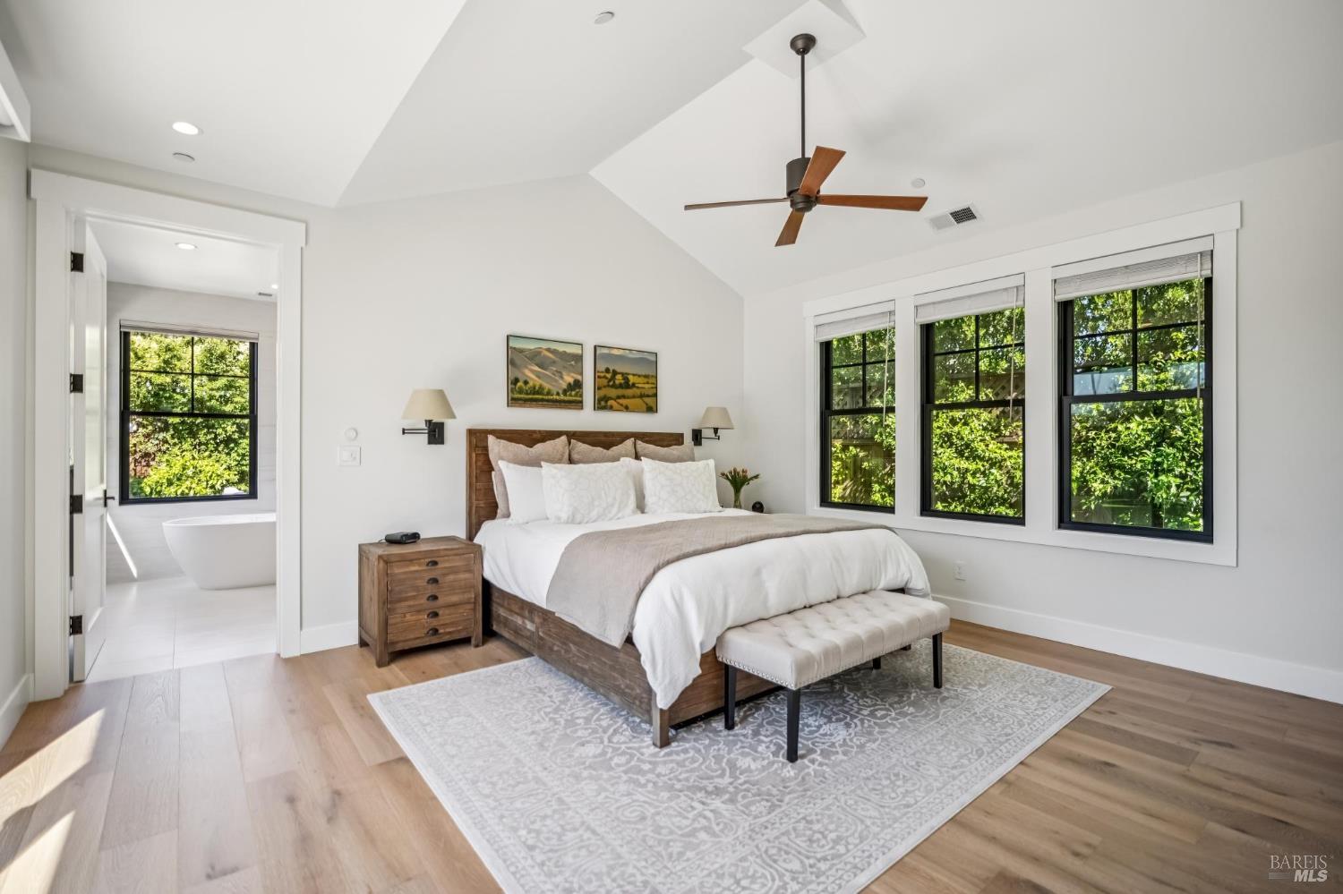 85 Harriet Way Tiburon, CA 94920 - Photo 19 of 44 a bedroom with a bed lamps and window