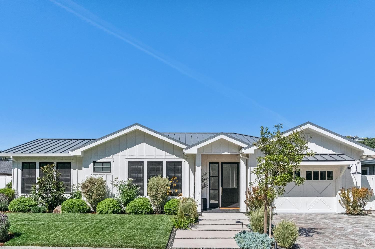 85 Harriet Way Tiburon, CA 94920 - Photo 2 of 44 a front view of a house with a yard