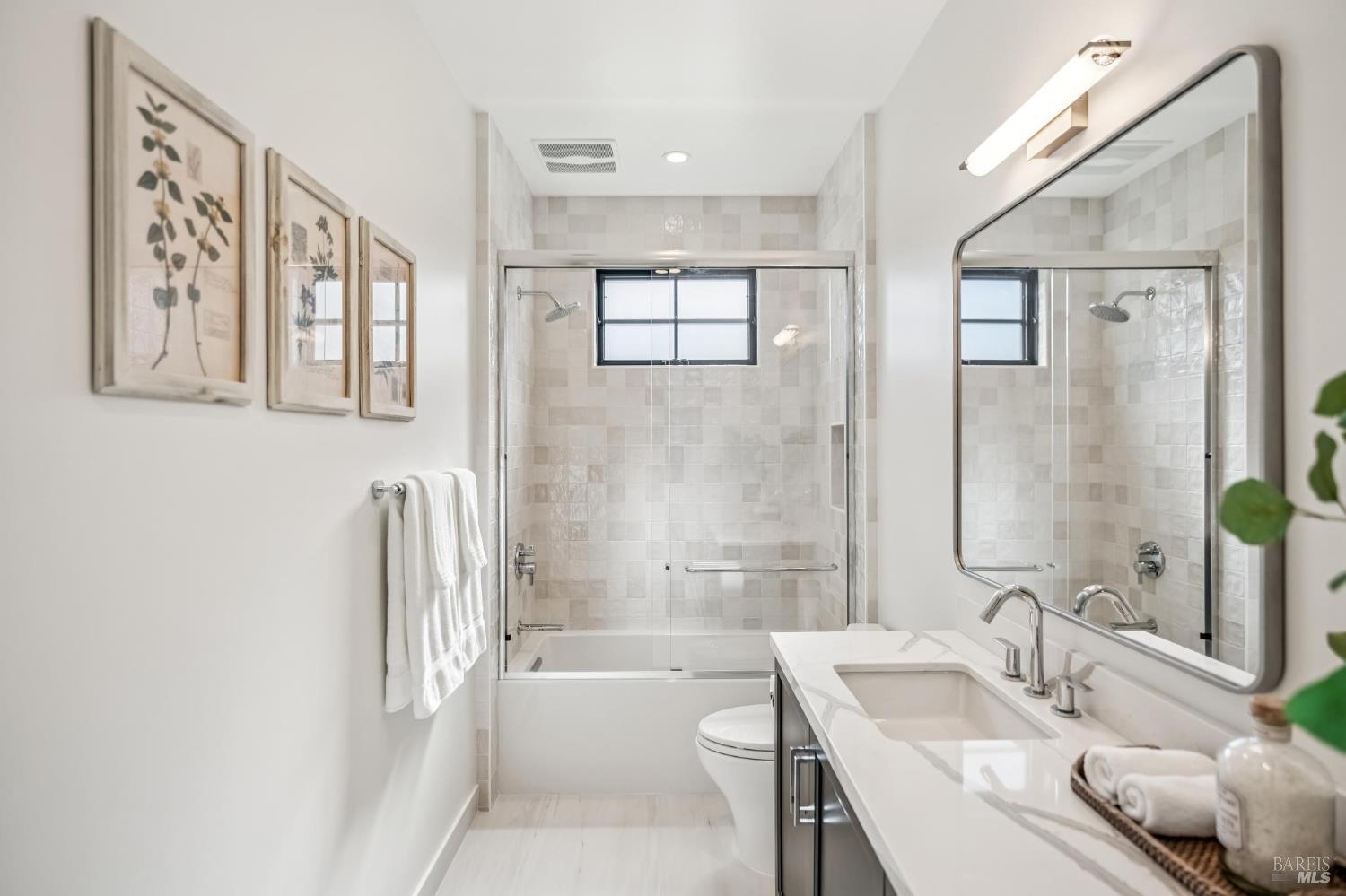 85 Harriet Way Tiburon, CA 94920 - Photo 23 of 44 a bathroom with a tub sink and mirror