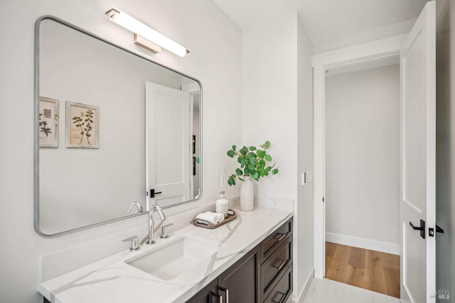 85 Harriet Way Tiburon, CA 94920 - Photo 24 of 44 a bathroom with a sink and a mirror