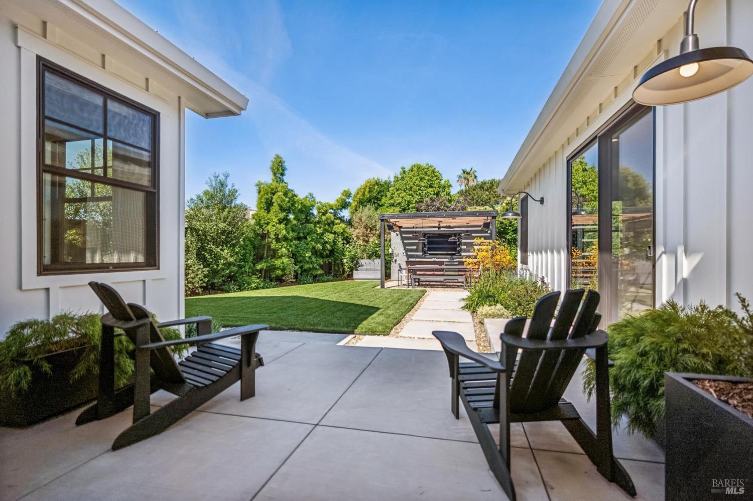 85 Harriet Way Tiburon, CA 94920 - Photo 27 of 44 a view of backyard with outdoor seating and plants