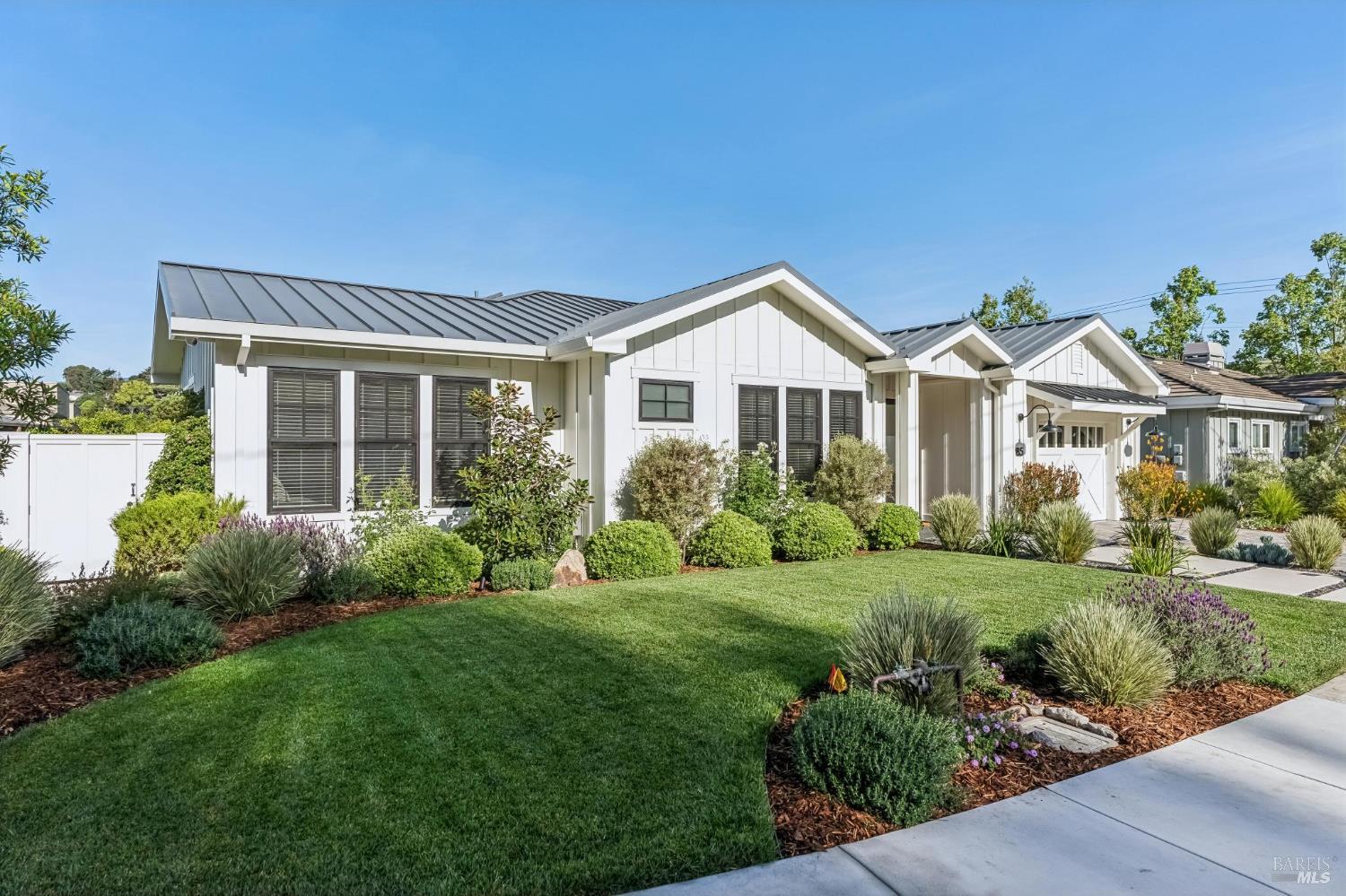85 Harriet Way Tiburon, CA 94920 - Photo 3 of 44 a front view of a house with a yard