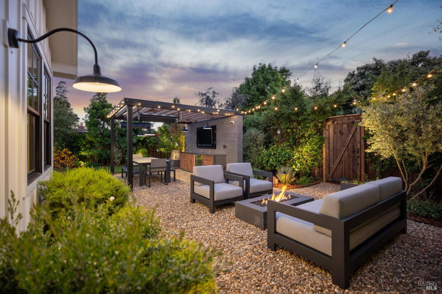 85 Harriet Way Tiburon, CA 94920 - Photo 41 of 44 a view of a patio with couches table and chairs and potted plants