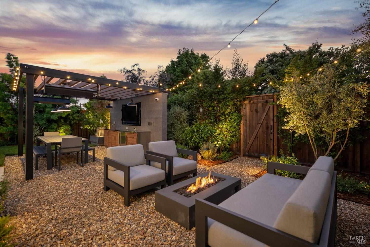 85 Harriet Way Tiburon, CA 94920 - Photo 42 of 44 a view of a patio with couches chairs and a potted plant