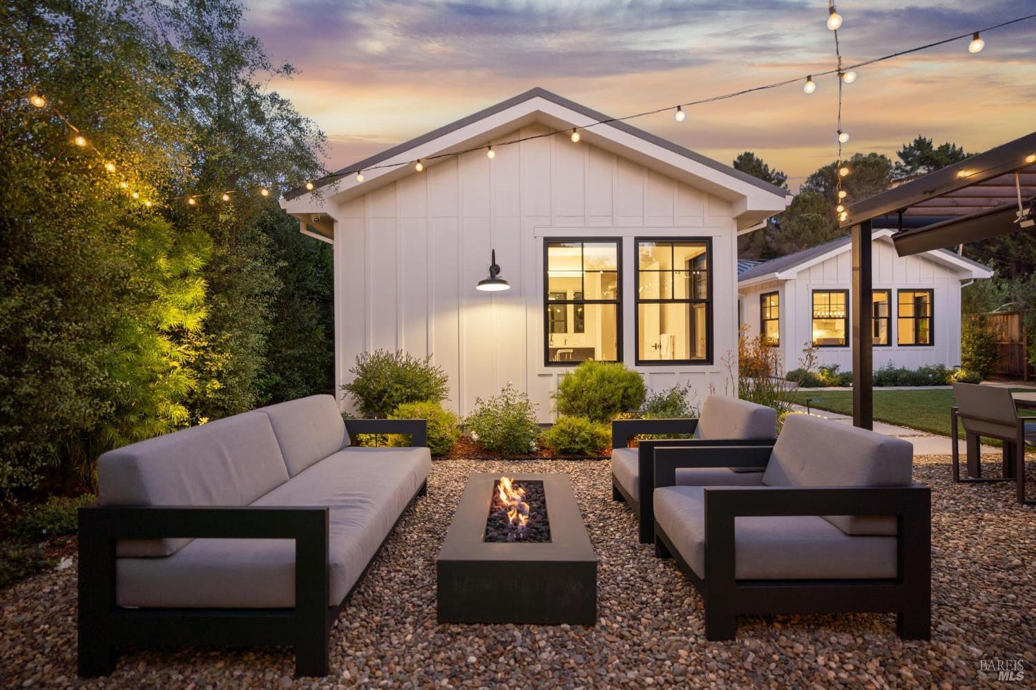 85 Harriet Way Tiburon, CA 94920 - Photo 44 of 44 a view of a patio with couches table and chairs and potted plants