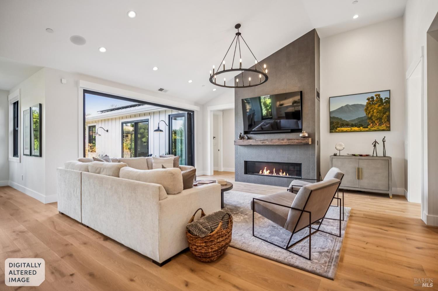 85 Harriet Way Tiburon, CA 94920 - Photo 7 of 44 a living room with furniture a flat screen tv and a fireplace