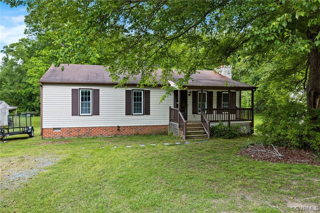 4906 Alberta Road Chesterfield, VA 23832 - Photo 21 of 21 a front view of a house with a garden and trees