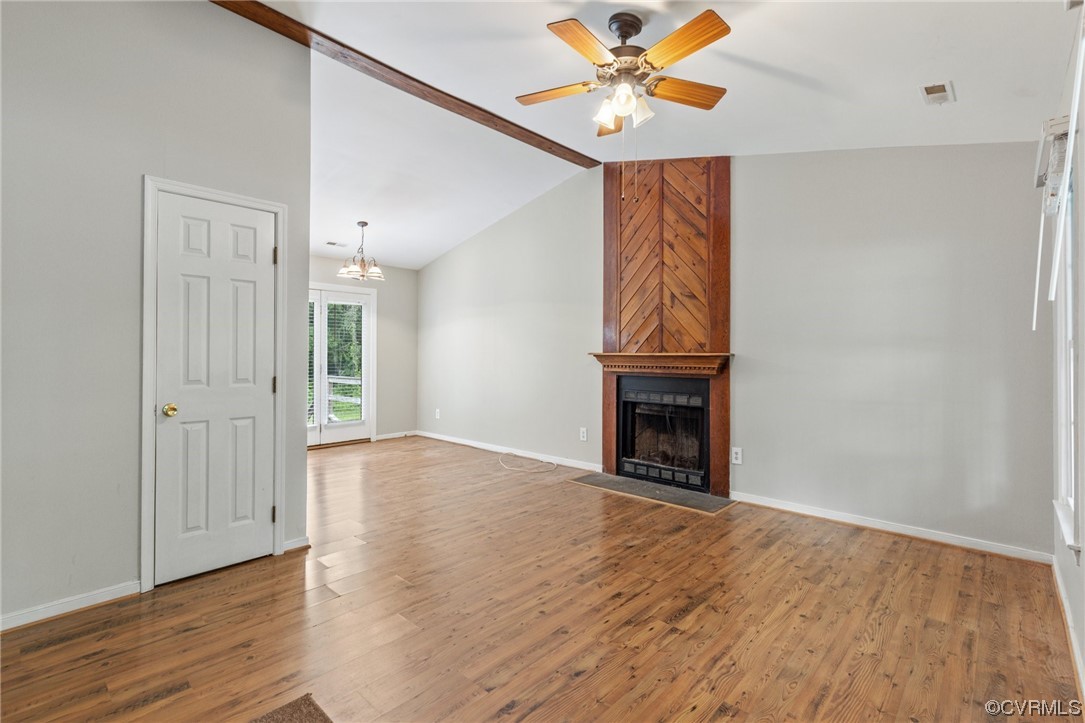 4906 Alberta Road Chesterfield, VA 23832 - Photo 3 of 21 a view of an empty room with a window and wooden floor