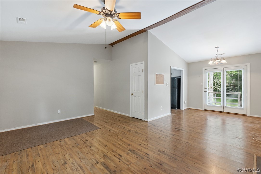 4906 Alberta Road Chesterfield, VA 23832 - Photo 4 of 21 a view of an empty room with window and wooden floor