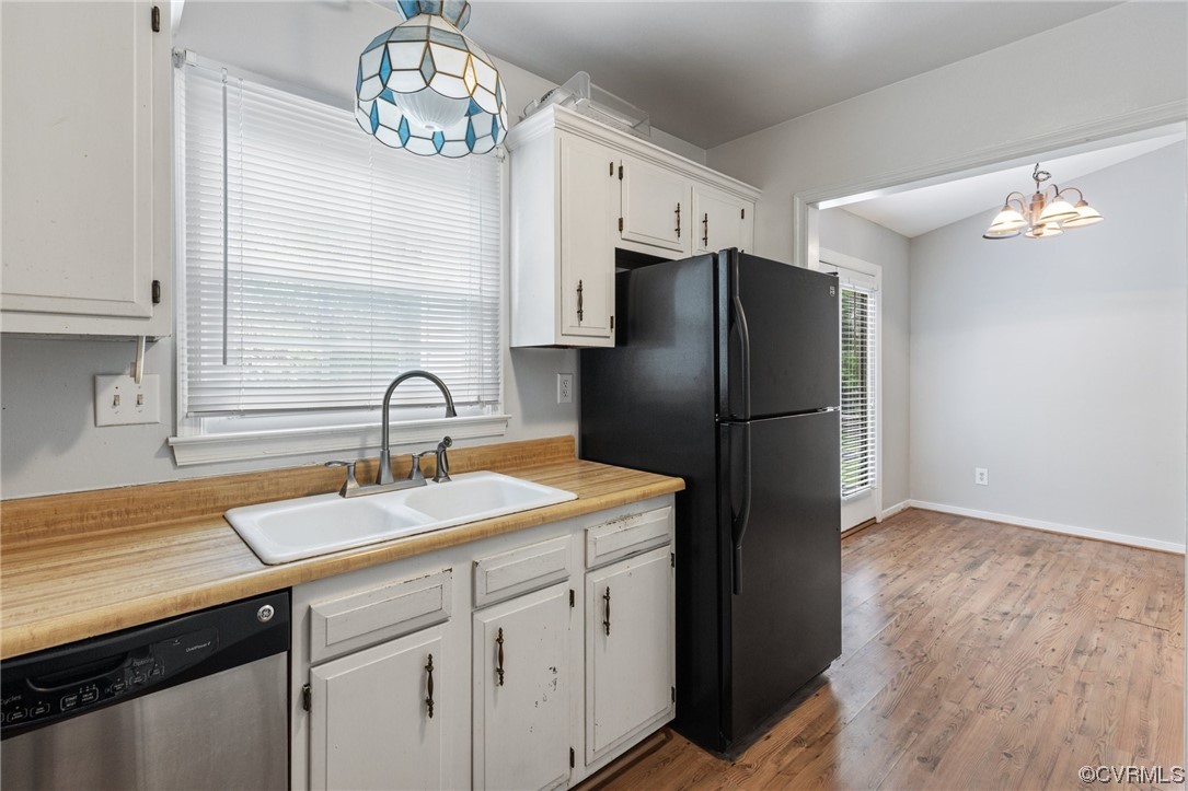 4906 Alberta Road Chesterfield, VA 23832 - Photo 7 of 21 a kitchen with stainless steel appliances granite countertop a refrigerator and a sink