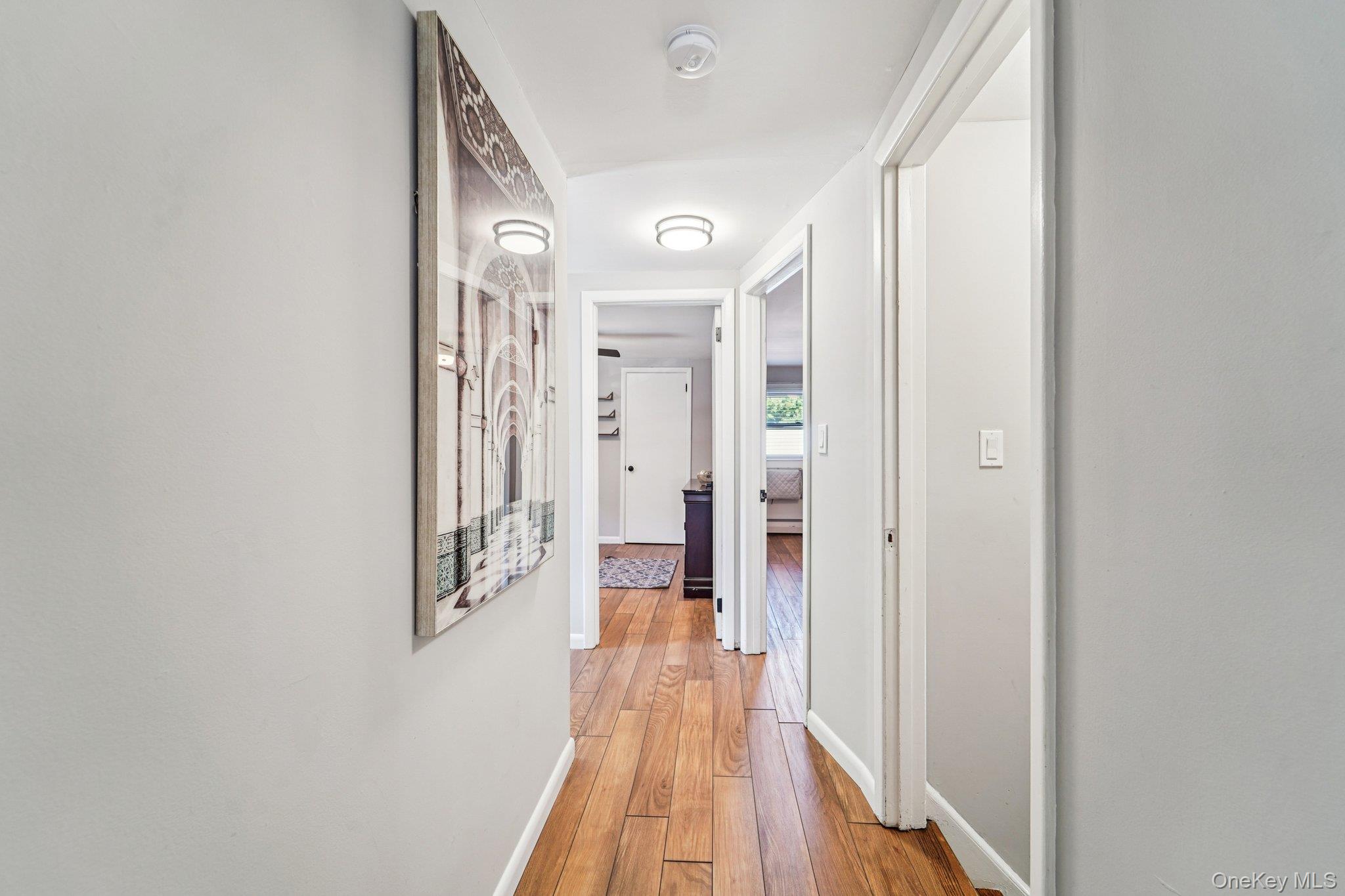 252 County Center Road White Plains, NY 10603 - Photo 22 of 44 Hallway with light wood-style flooring and baseboards