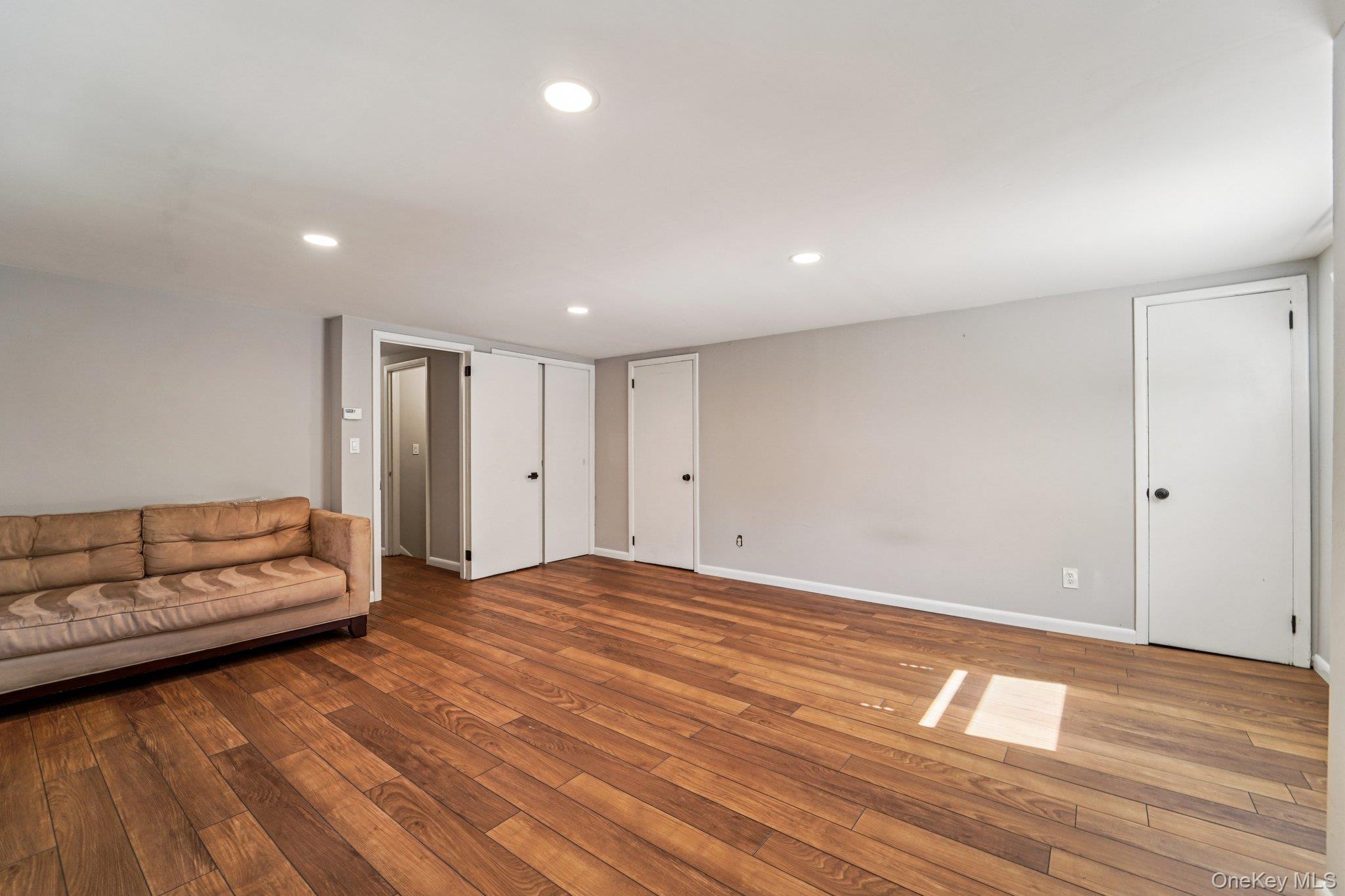 252 County Center Road White Plains, NY 10603 - Photo 25 of 44 Unfurnished living room with wood-type flooring and recessed lighting
