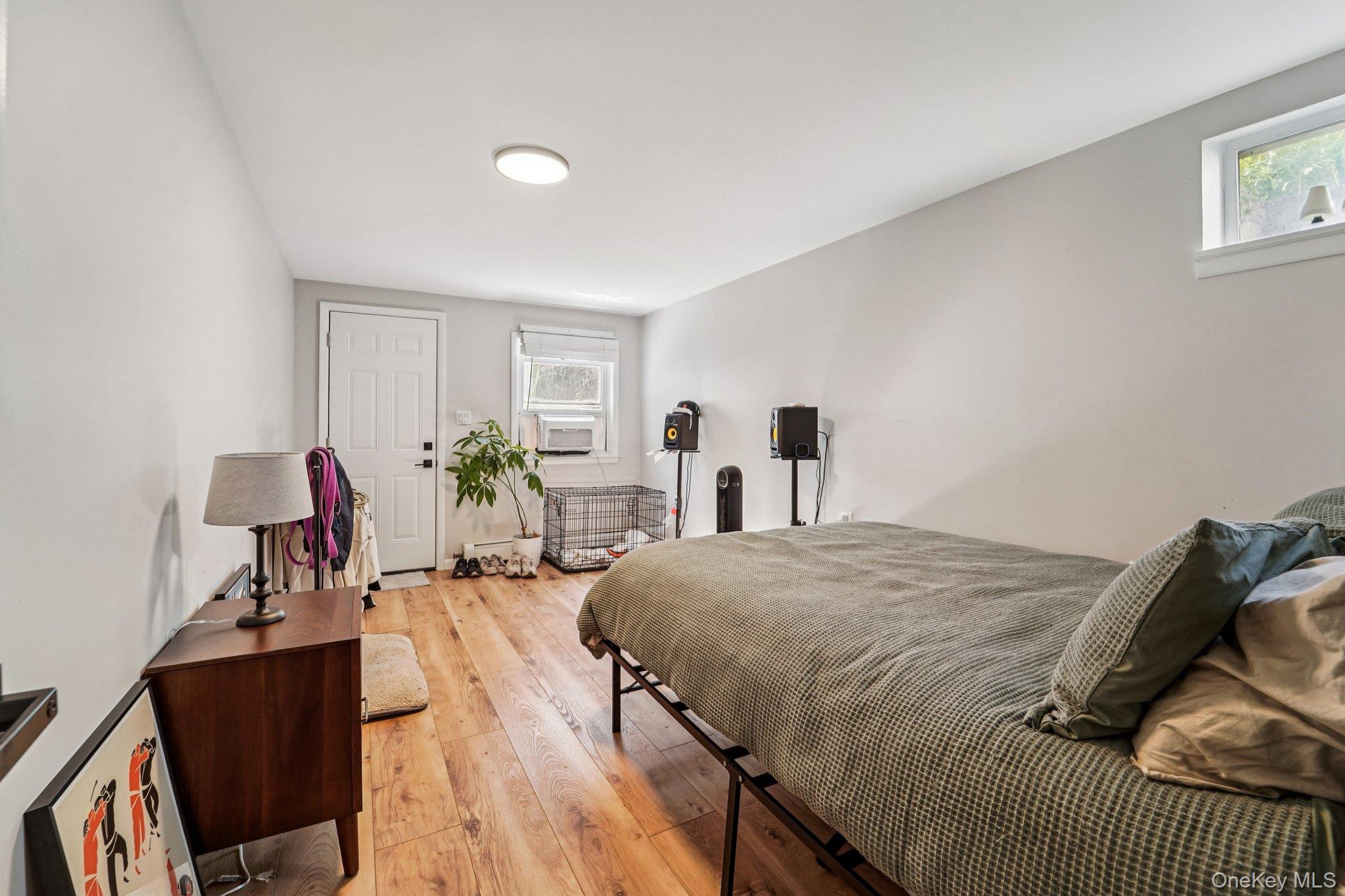252 County Center Road White Plains, NY 10603 - Photo 32 of 44 Bedroom featuring multiple windows and light wood-style floors