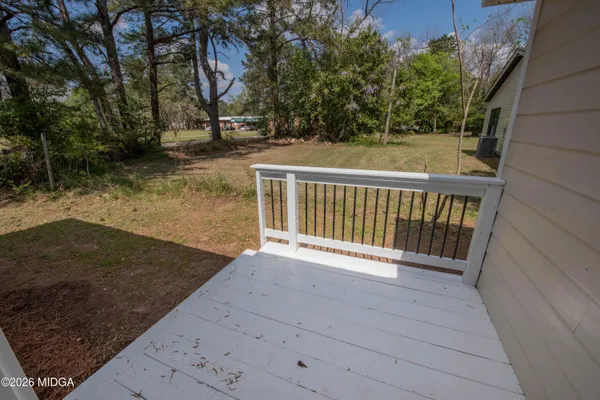 a view of a balcony with an outdoor space