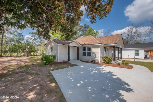 a front view of a house with patio