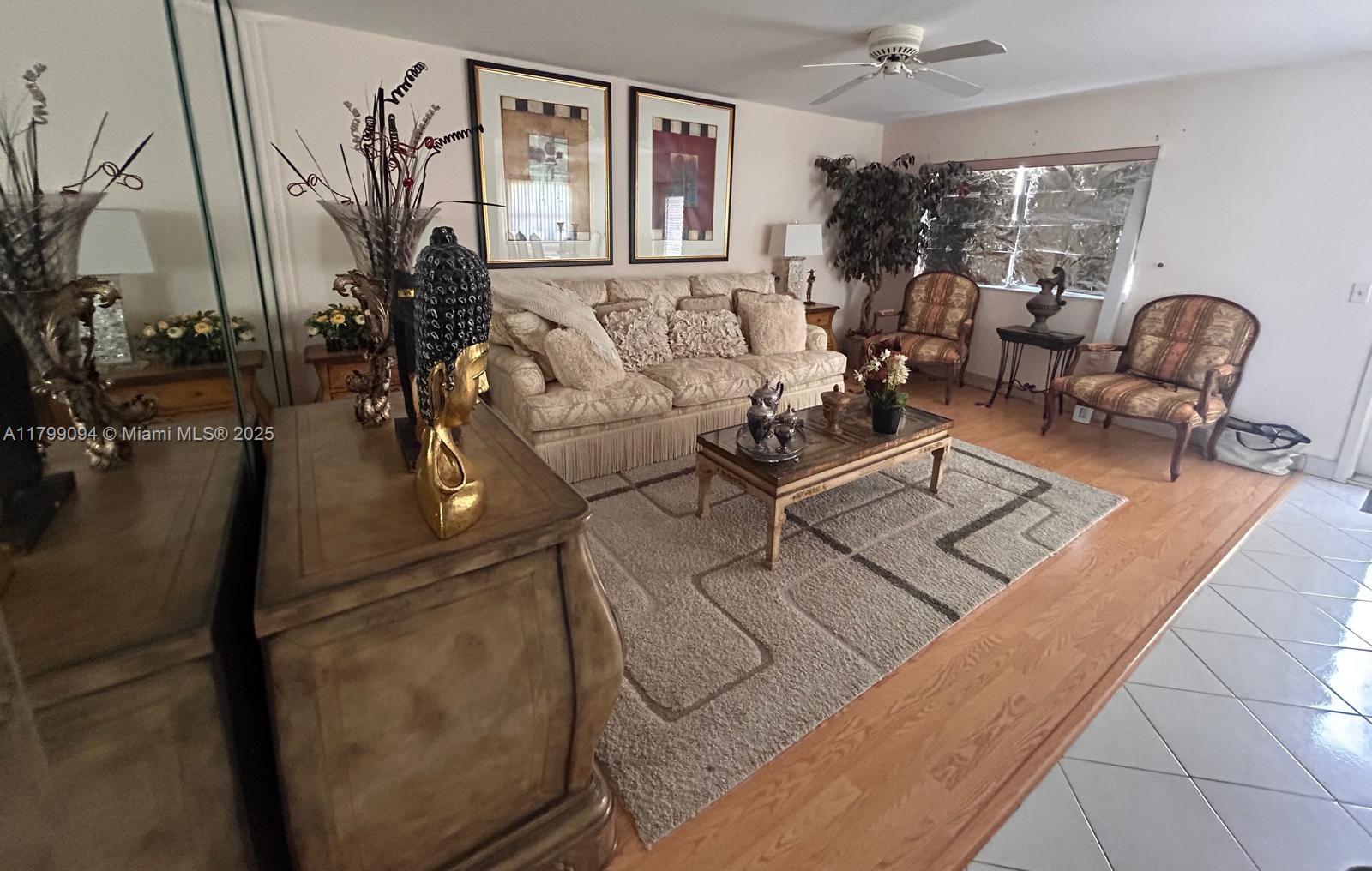 92 Saxony B, Unit B Delray Beach, FL 33446 - Photo 2 of 9 a living room with furniture
