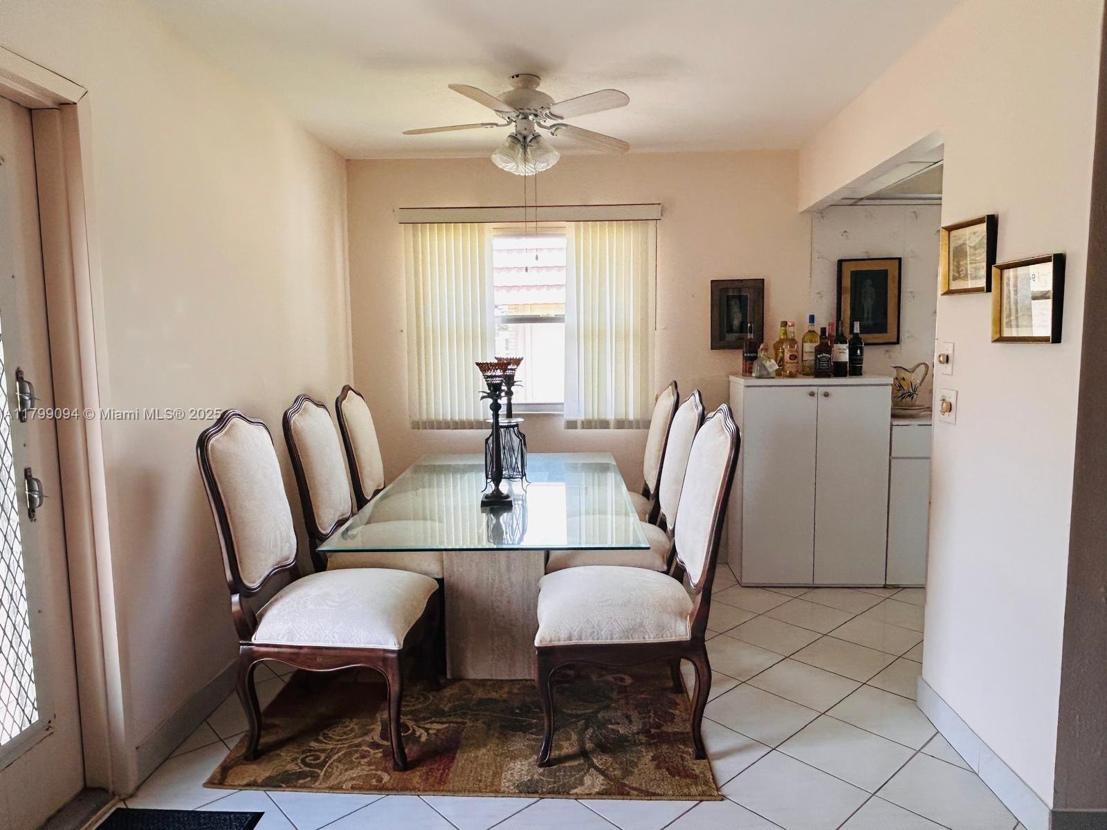 92 Saxony B, Unit B Delray Beach, FL 33446 - Photo 3 of 9 a view of a dining room with furniture