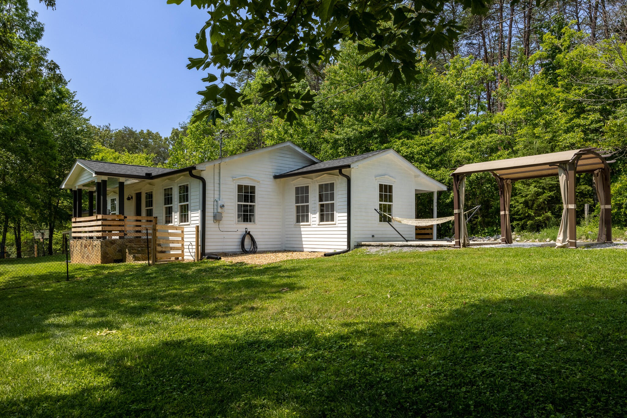 146 County Road 677 Riceville, TN 37370 - Photo 1 of 32 a front view of house with yard and green space