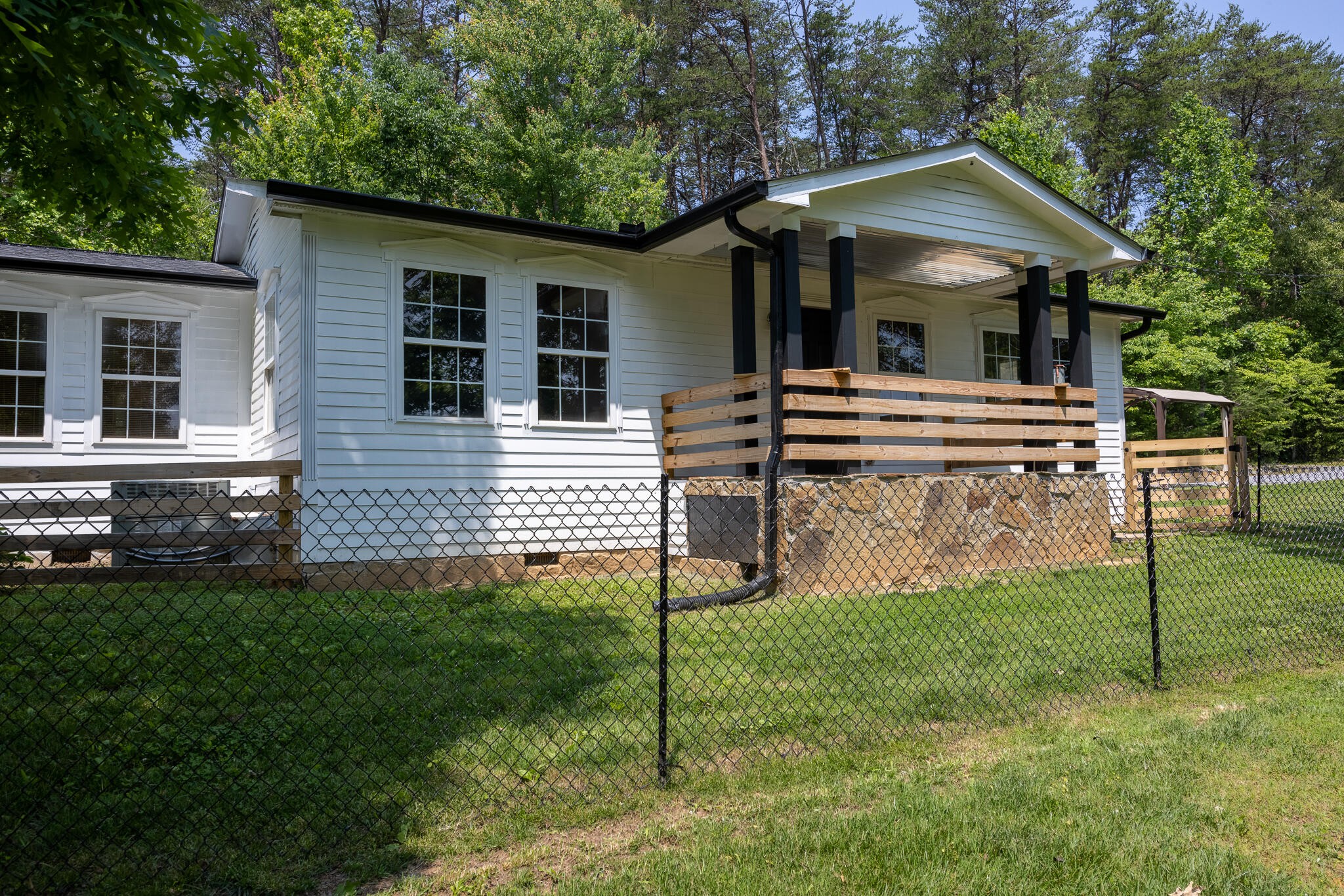 146 County Road 677 Riceville, TN 37370 - Photo 3 of 32 a view of a house with a yard