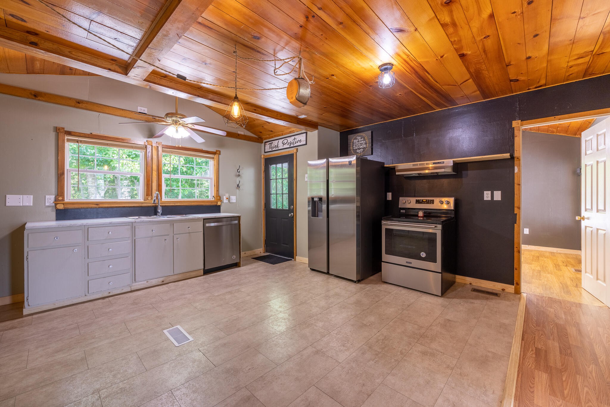 146 County Road 677 Riceville, TN 37370 - Photo 9 of 32 a view of a kitchen with refrigerator and windows