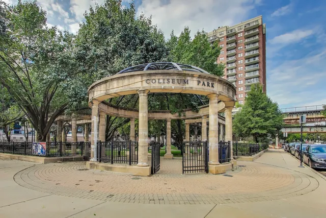 a park view with a sitting space and garden
