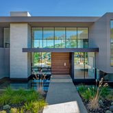 a house view with sitting space and garden space