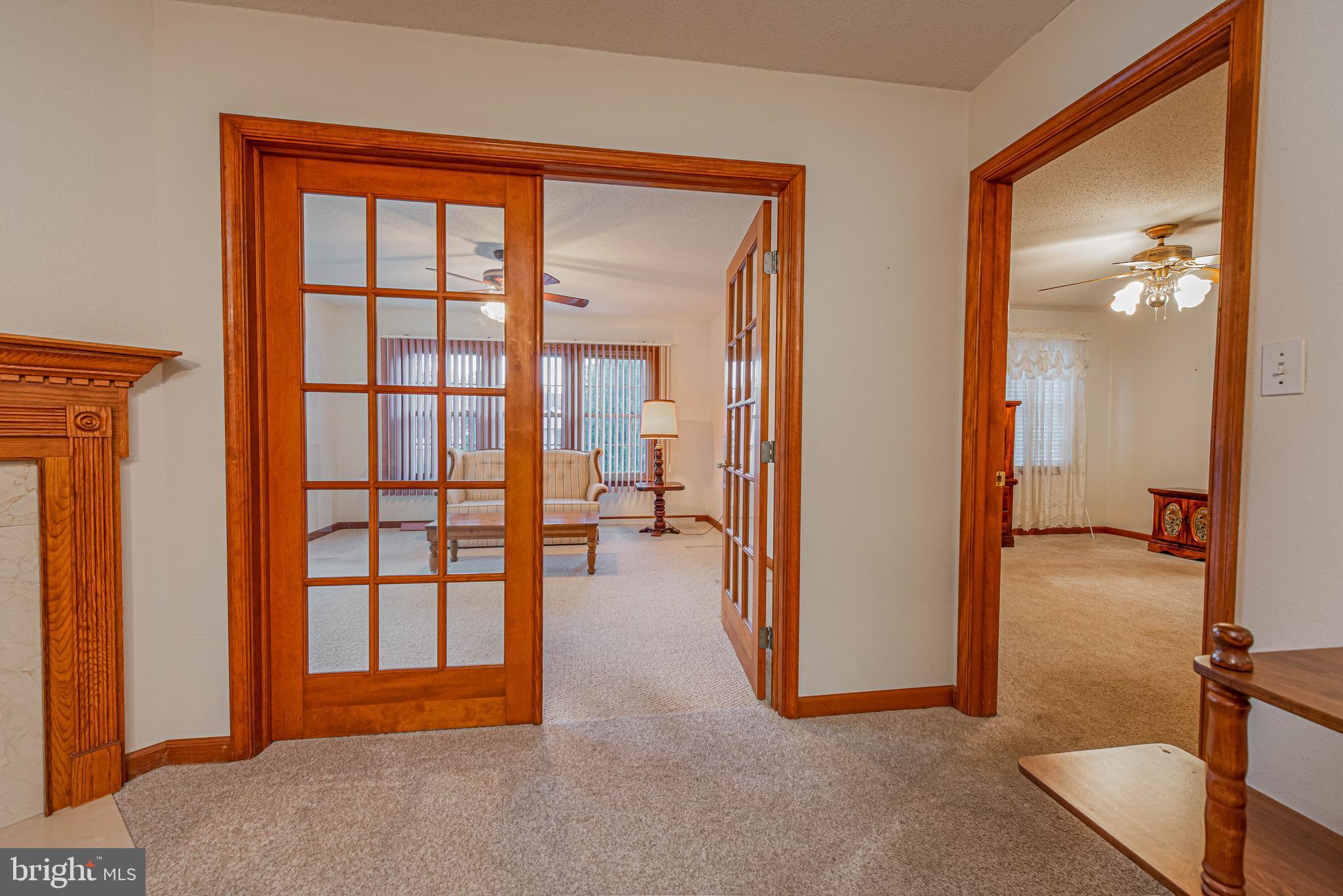 35772 Egret Road Selbyville, DE 19975 - Photo 15 of 38 wooden floor and windows in a room