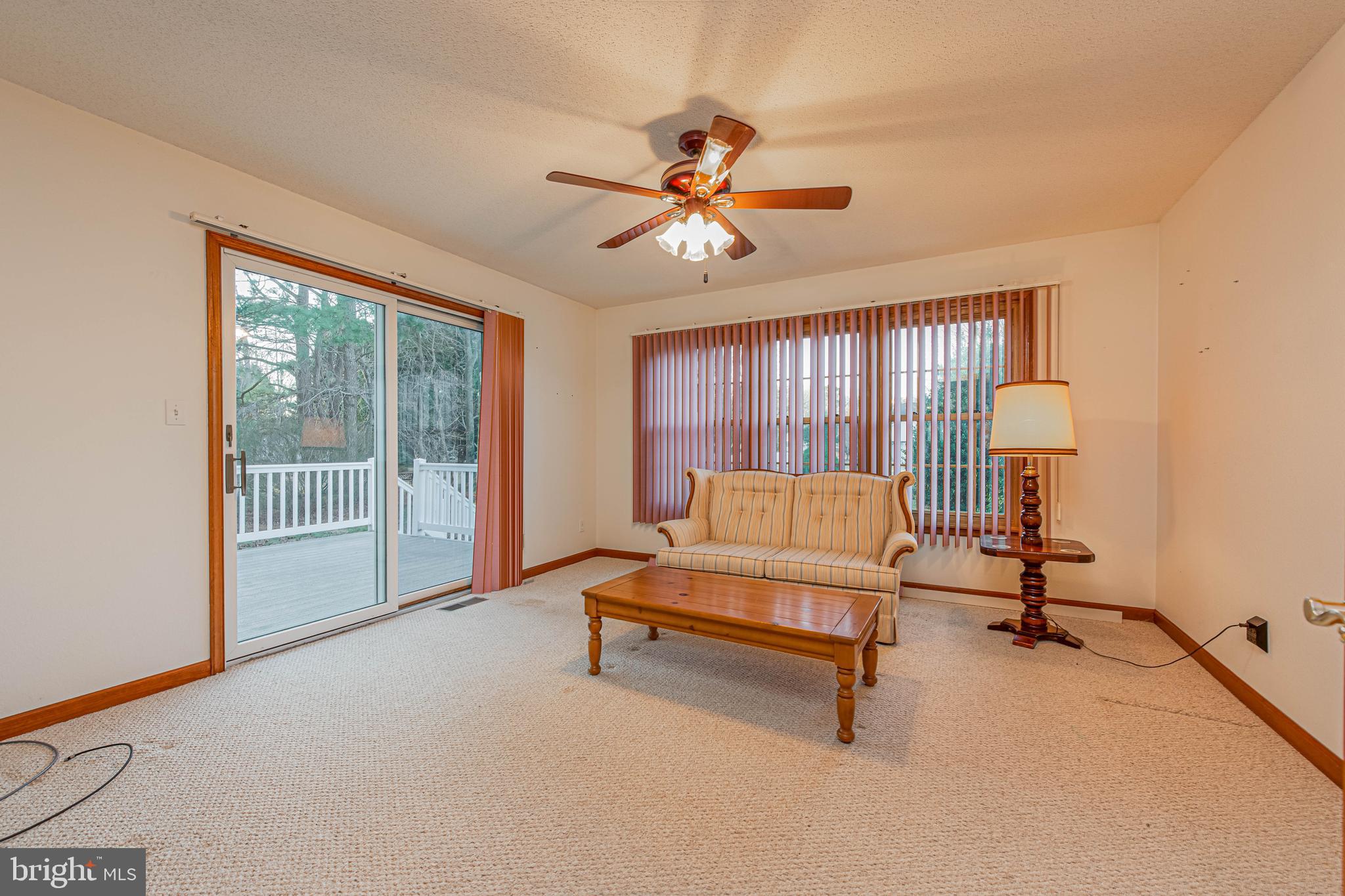 35772 Egret Road Selbyville, DE 19975 - Photo 17 of 38 a living room with furniture and a window