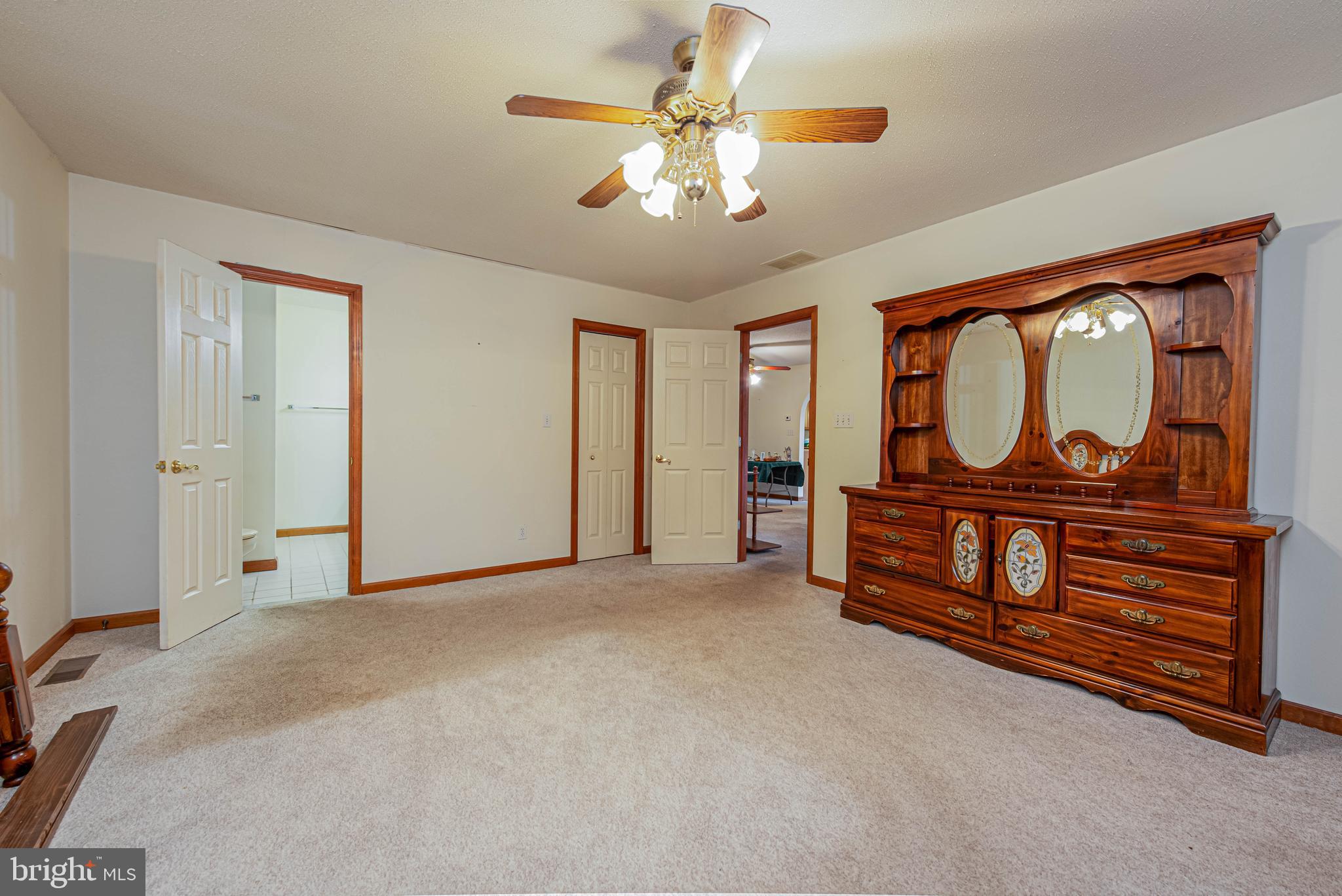 35772 Egret Road Selbyville, DE 19975 - Photo 24 of 38 a view of an empty room with window cabinet and mirror