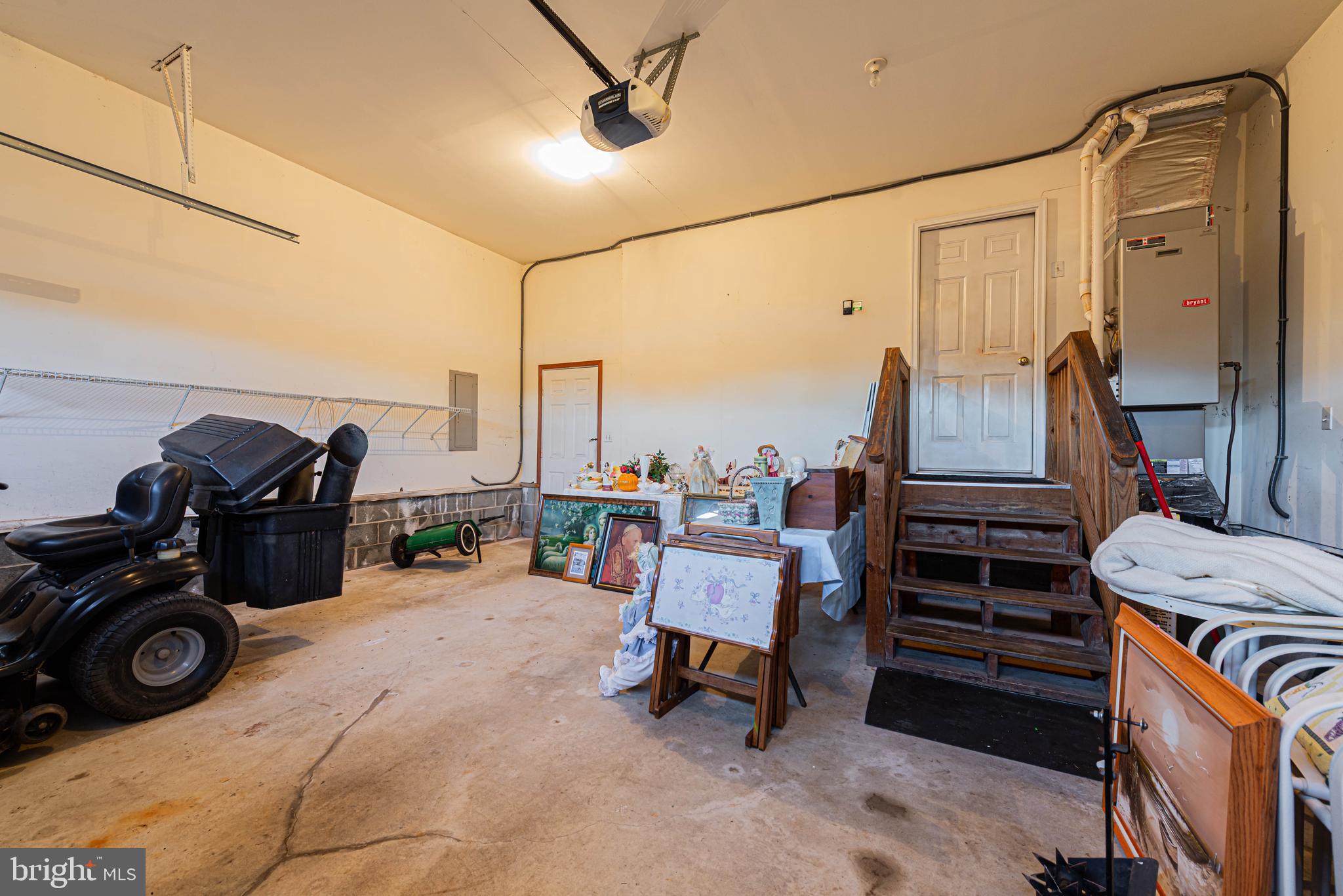 35772 Egret Road Selbyville, DE 19975 - Photo 33 of 38 a bedroom with furniture and a flat screen tv