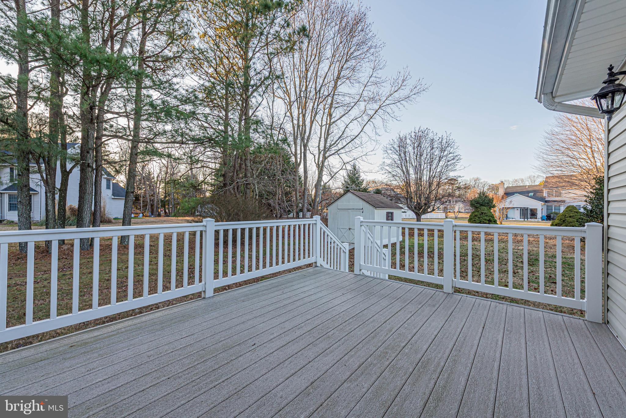 35772 Egret Road Selbyville, DE 19975 - Photo 9 of 38 a view of deck with wooden floor and fence