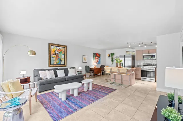 a living room with furniture and a couch