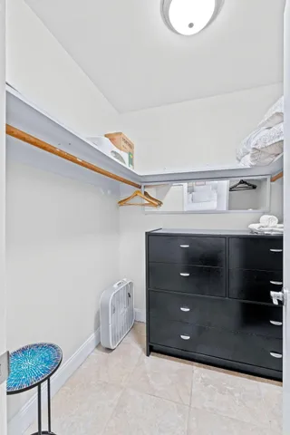 a bathroom with a sink a vanity and a mirror