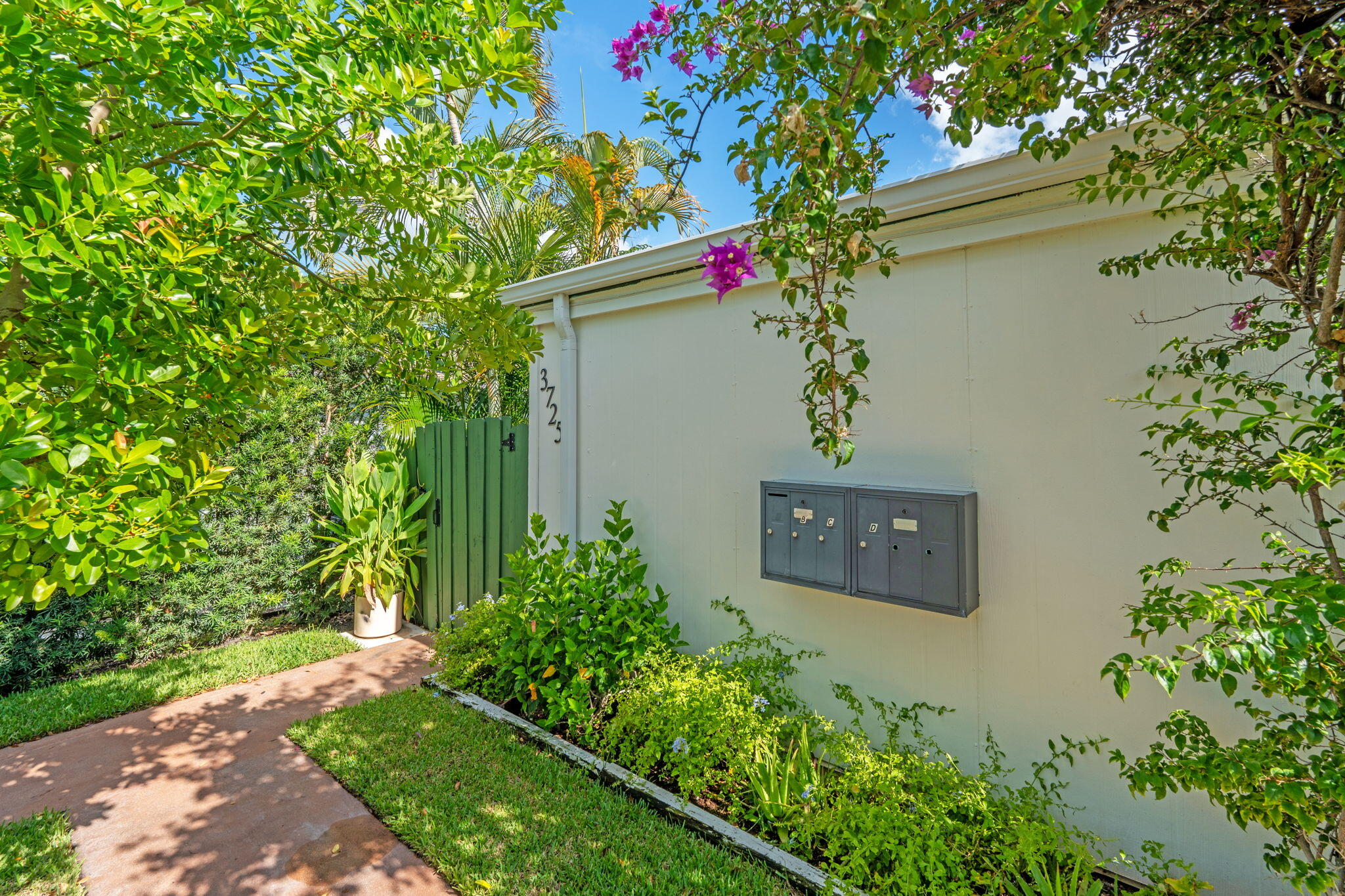 3725 South Olive Avenue, Unit A West Palm Beach, FL 33405 - Photo 4 of 35 a sign that is sitting in front of a house