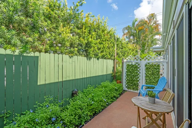 a garden view with a seating space