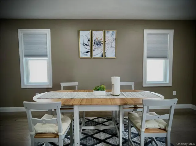 a bedroom with a bed and a lamp