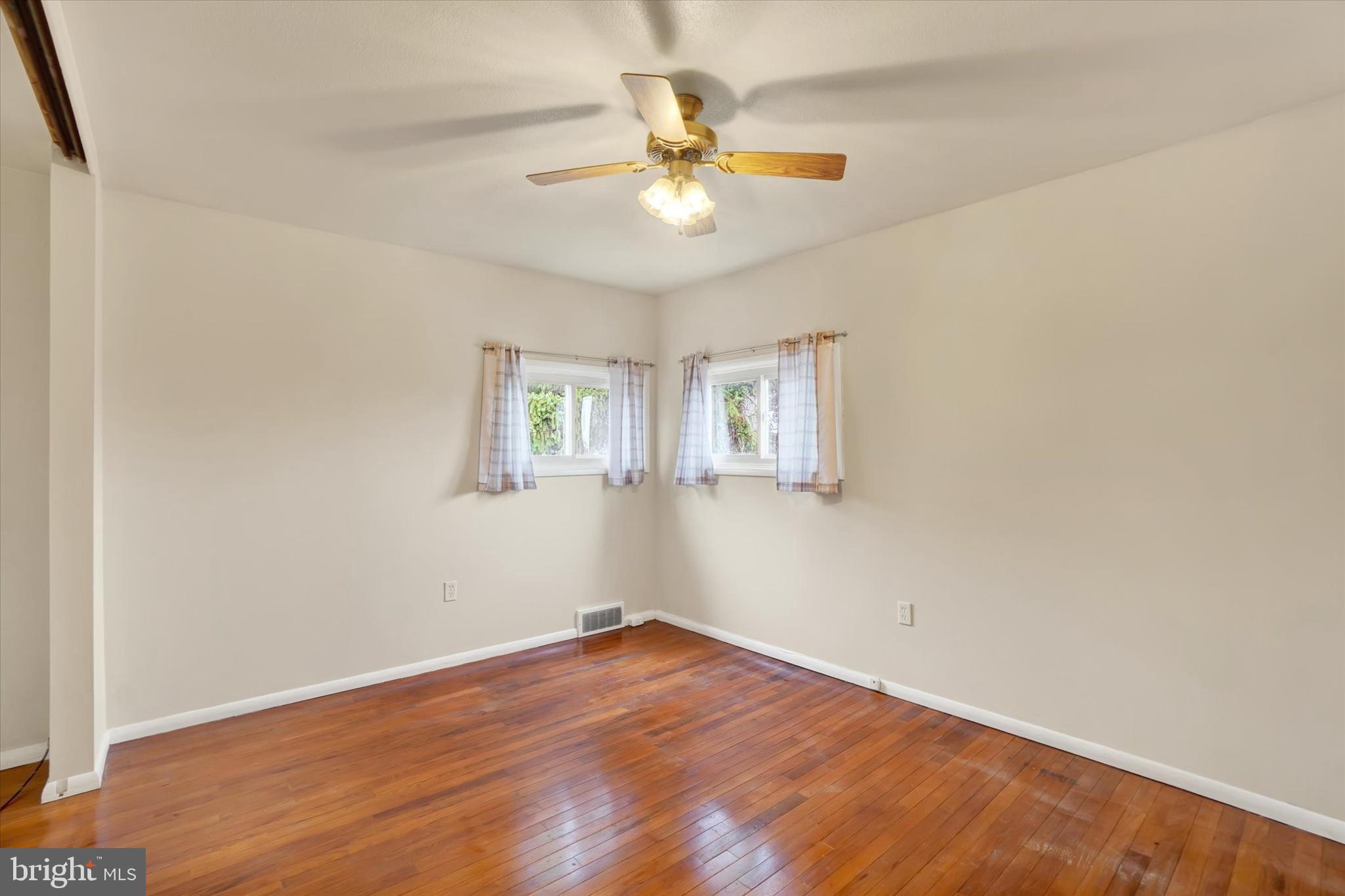 310 Herman Street York, PA 17404 - Photo 14 of 31 Primary Bedroom with hardwood floors