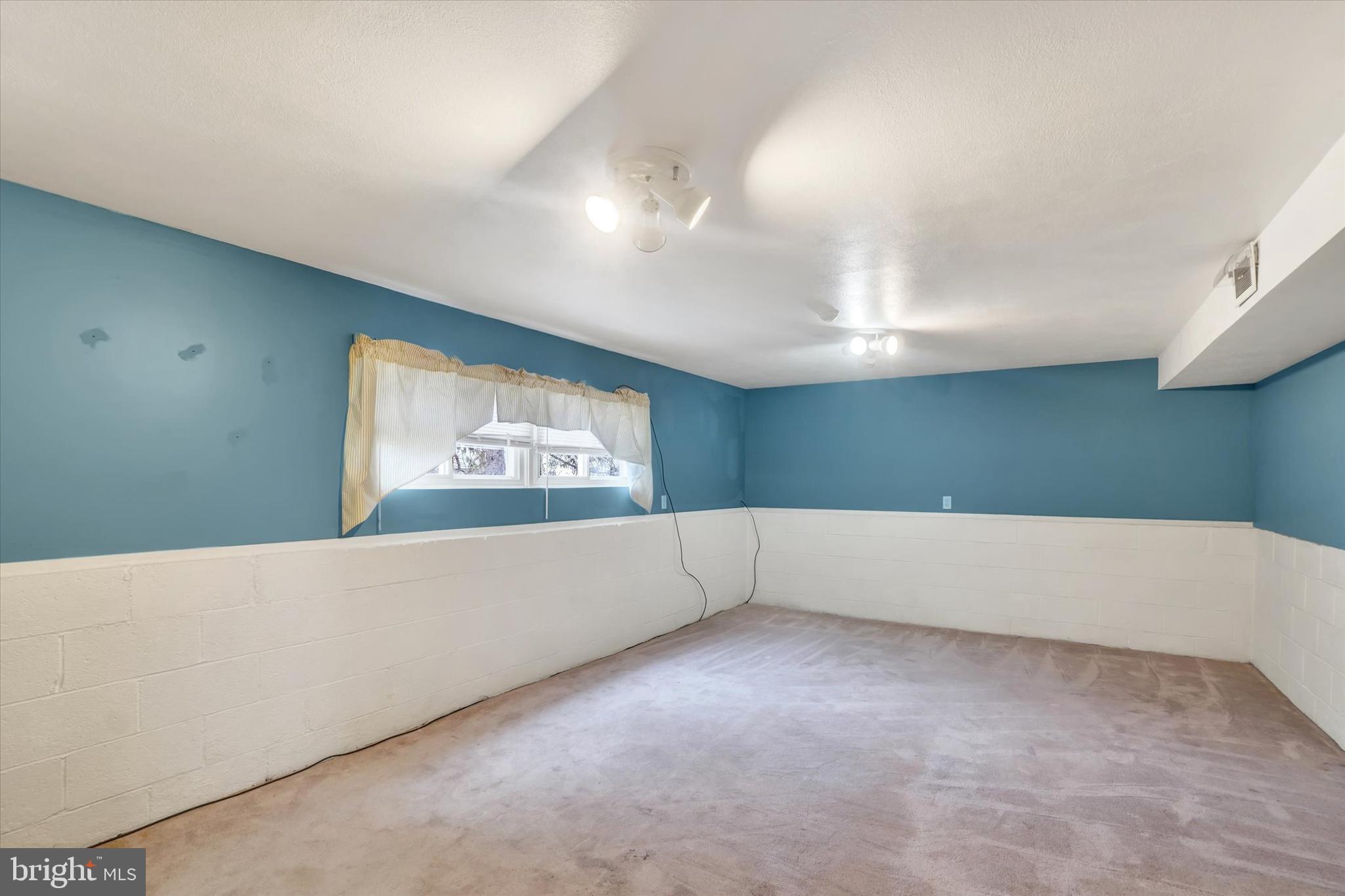 310 Herman Street York, PA 17404 - Photo 22 of 31 Lower level natural lighting & entertainment space