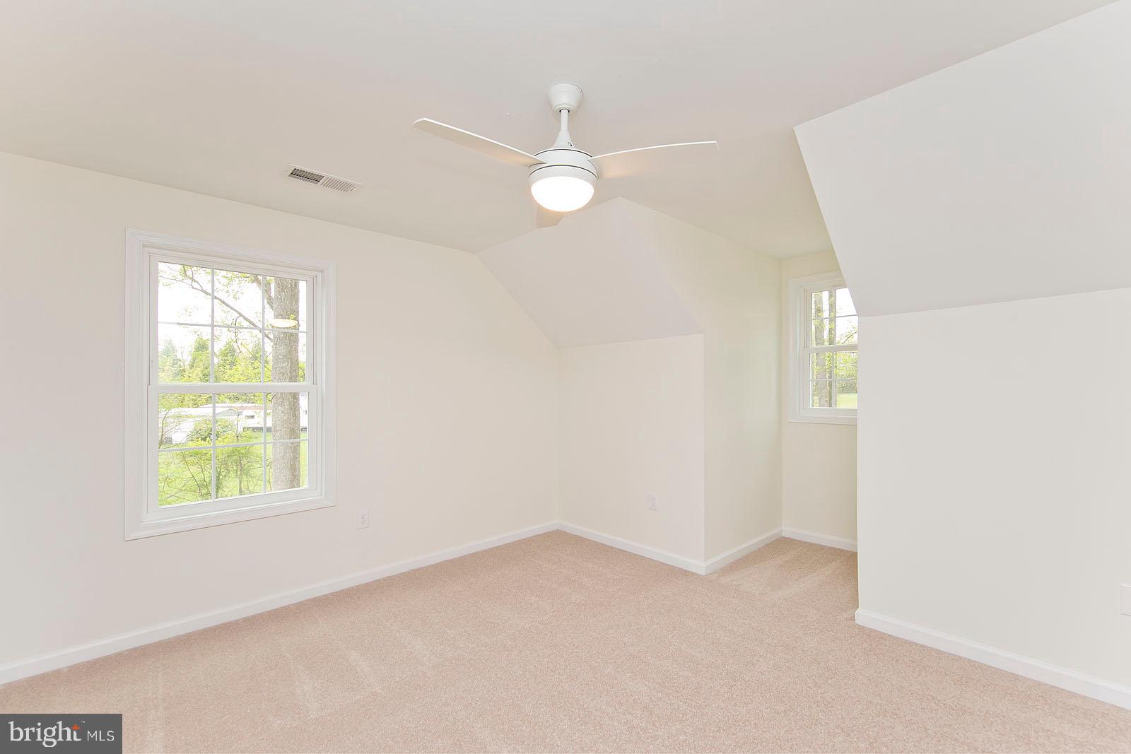 320 Pine Grove Road Bluemont, VA 20135 - Photo 21 of 28 an empty room with windows and closet