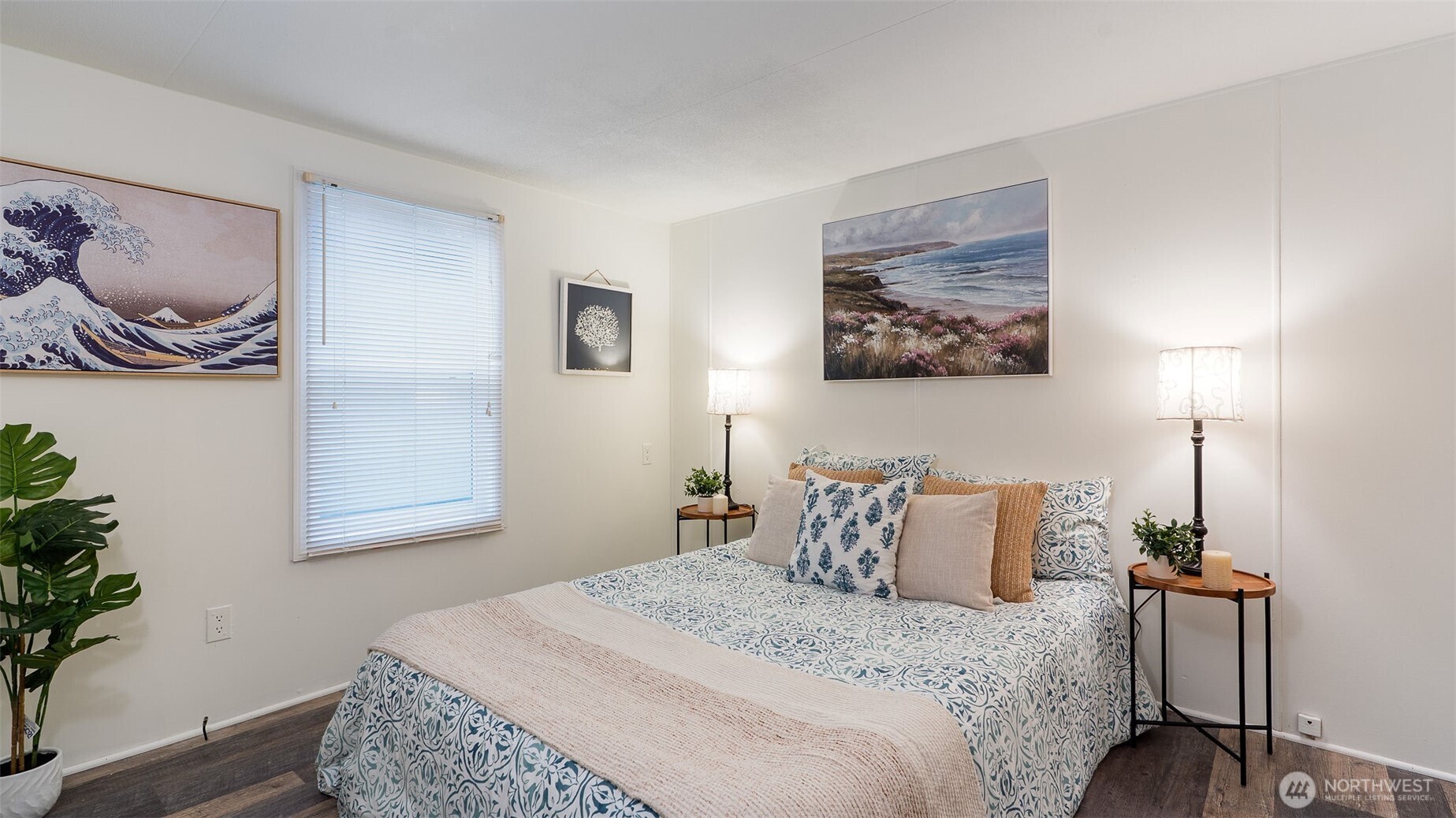 11622 Silver Lake Road, Unit 20B Everett, WA 98208 - Photo 12 of 38 a bedroom with a bed and wooden floor