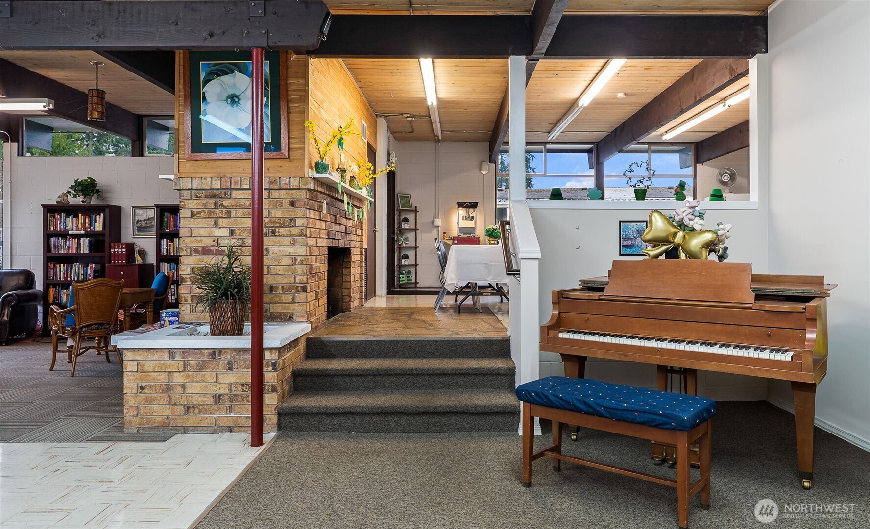 11622 Silver Lake Road, Unit 20B Everett, WA 98208 - Photo 30 of 38 a outdoor space with lots of furniture and a fireplace