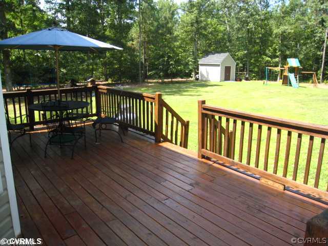 11511 Winterpock Road Chesterfield, VA 23838 - Photo 11 of 12 a balcony with table and chairs