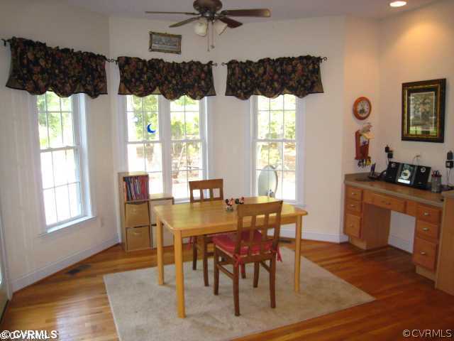 11511 Winterpock Road Chesterfield, VA 23838 - Photo 6 of 12 a view of a dining room and furniture window and wooden floor