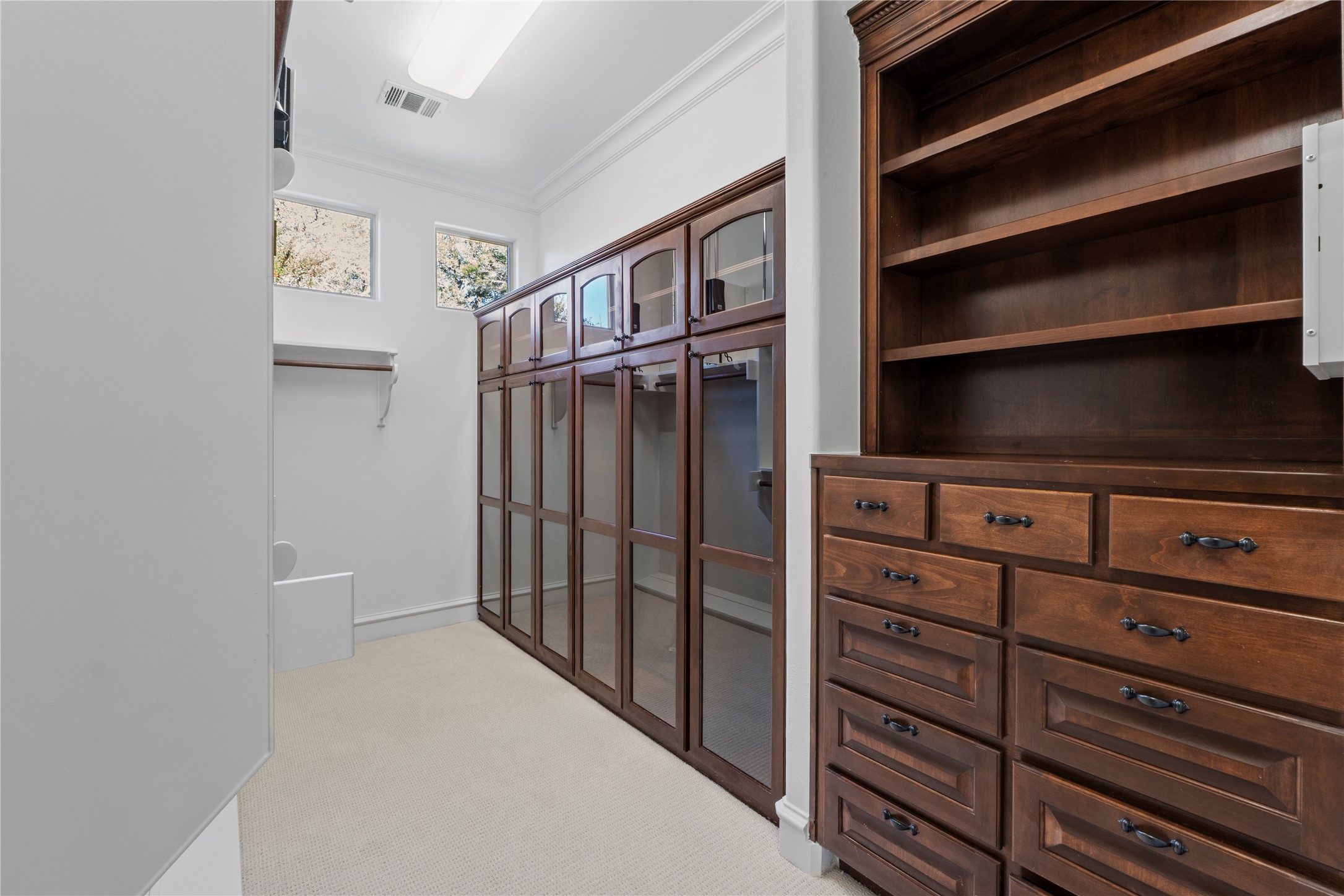 3401 Pearce Road Austin, TX 78730 - Photo 15 of 37 Large walk-in Owners closet with seasonal hanging space