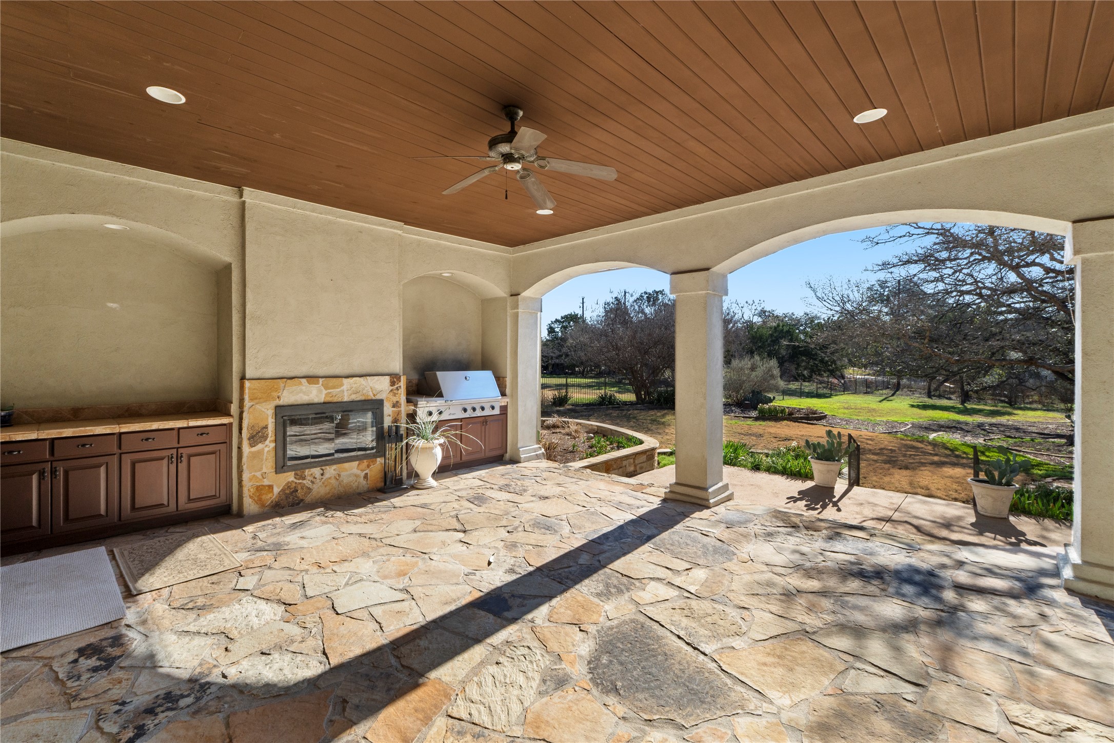 3401 Pearce Road Austin, TX 78730 - Photo 31 of 38 Spacious covered patio with built in BBQ and Fireplace