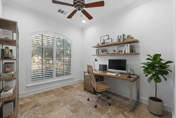 a view of a workspace with furniture