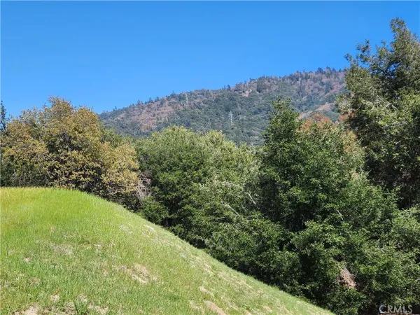 a view of a field with an outdoor space