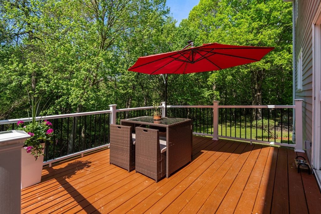 11 Cow Hill Road Sharon, MA 02067 - Photo 28 of 30 a view of balcony with wooden floor and outdoor seating