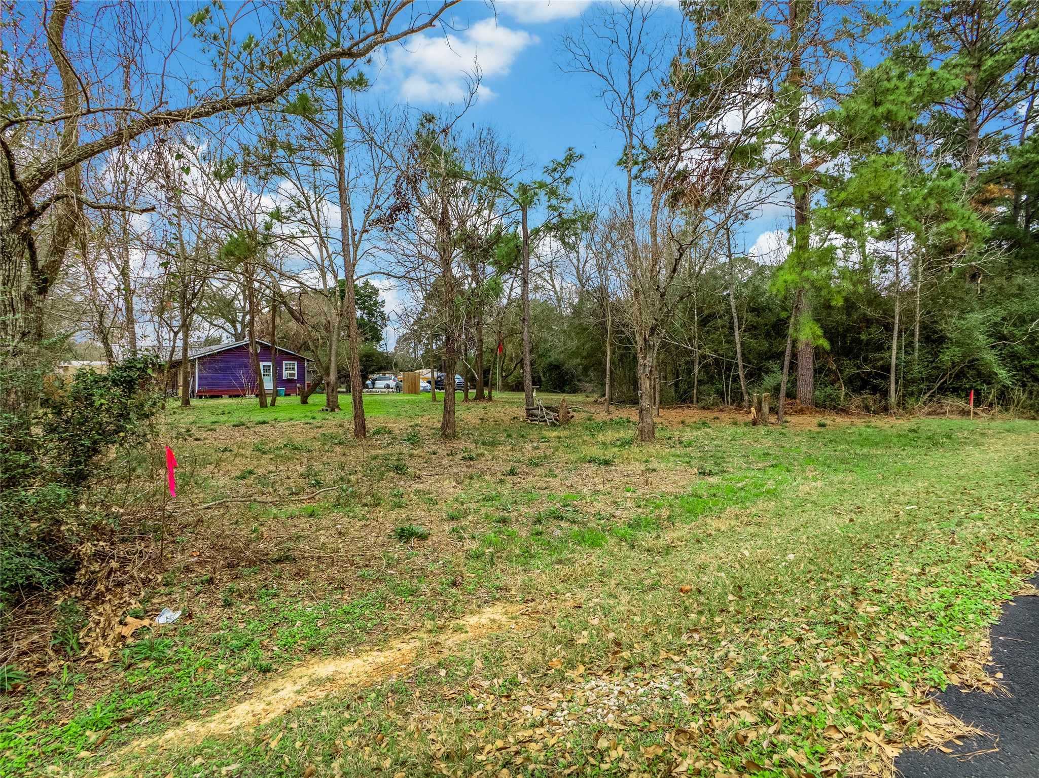 650 Texas Street Tomball, TX 77375 - Photo 2 of 22 a view of outdoor space with deck and yard